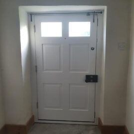 Bespoke Accoya timber door set with From The Anvil hardware in Stoke St Gregory